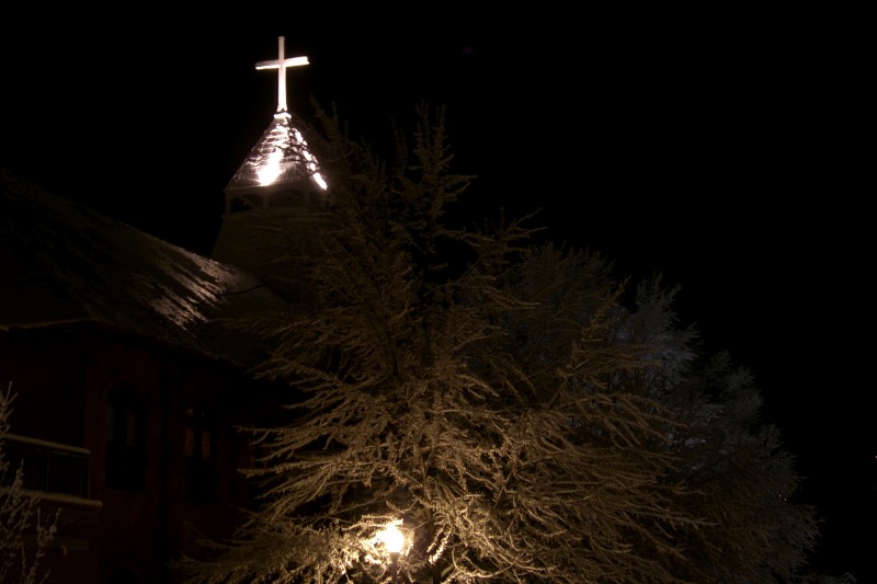 In memory...  Cross and steeple of St. Mary�s Catholic Church, on Main Street in Aspen.
